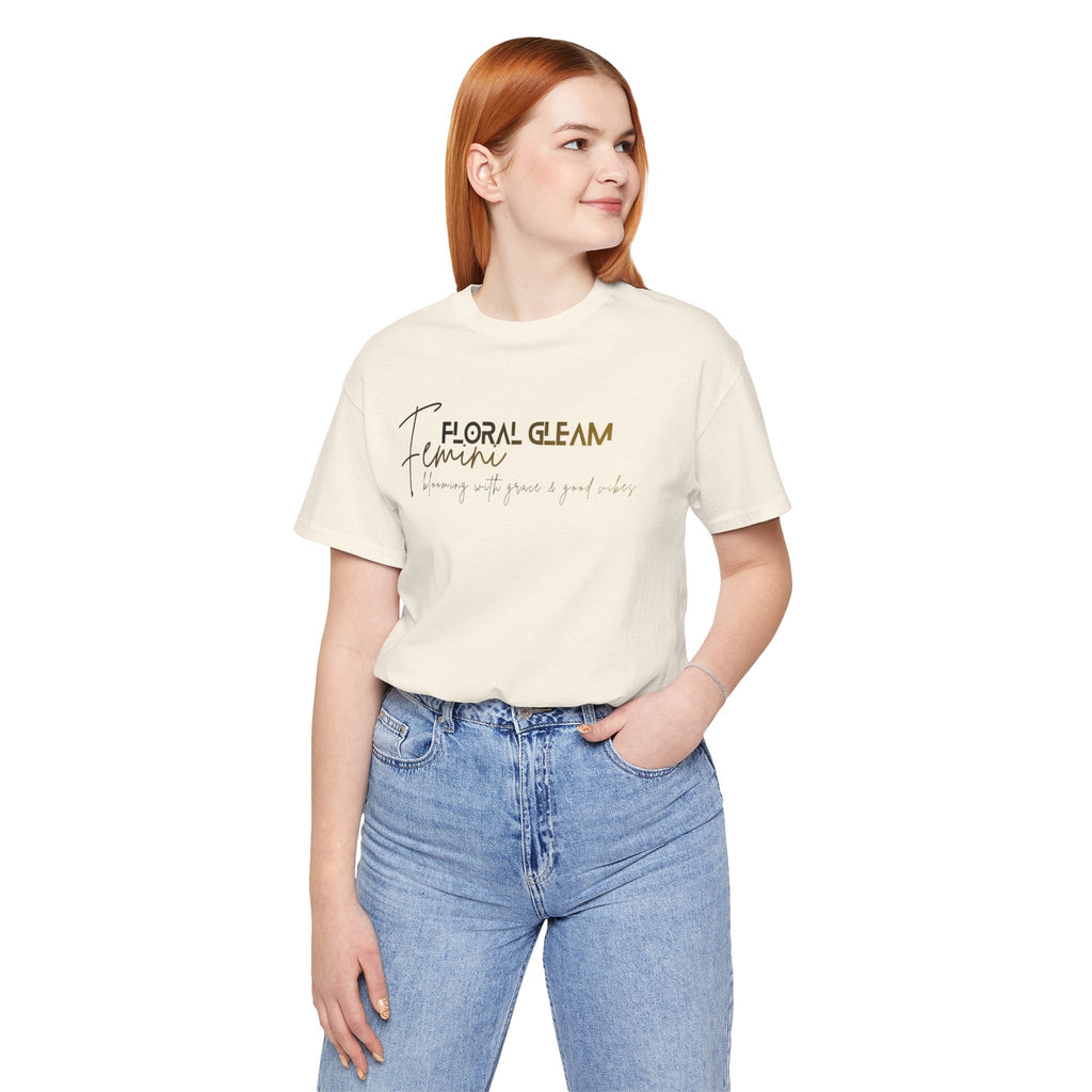 Person wearing a cream t-shirt with 'MEMENTO MORI' text on a white background